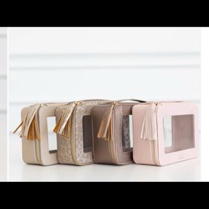 Hollis make up or toiletry bag. In the leopard.